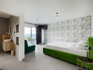 Schlafzimmer mit Meerblick, Balkon und ensuite Bad