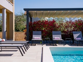 Outdoor area with private Pool in holiday villa in Pula