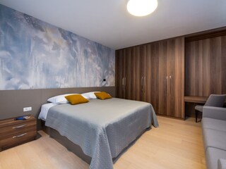 Bedroom with double bed and sofabed, villa in Pula