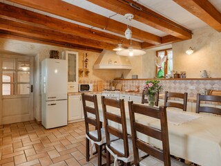 Fully equipped rustic kitchen and dining area