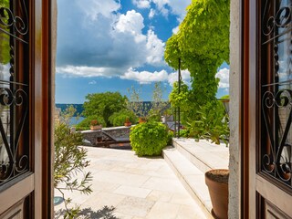 Terrace entrance with Mediterranean garden and sea view