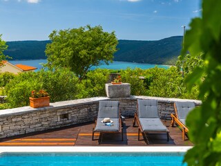 Pool terrace with panoramic views of Raša Bay