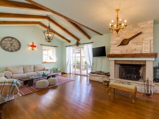 Spacious living area with fireplace, villa in Porec