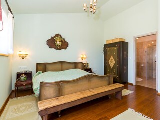 Bedroom with double bed and ensuite bathroom