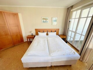 Schlafzimmer mit Balkon