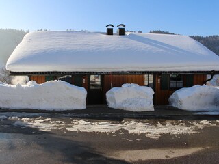 Winter-Doppelhaus Straßenansicht