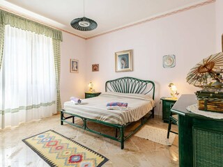 Bright bedroom with double bed