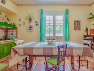 Dining table with sunny garden view