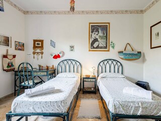 Single beds with retro movie posters