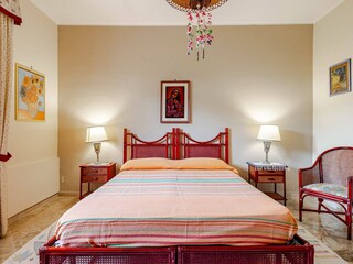 Inviting double bed in warm tones