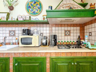 Fully equipped kitchen with gas stove