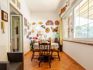 Dining nook with Sicilian fans