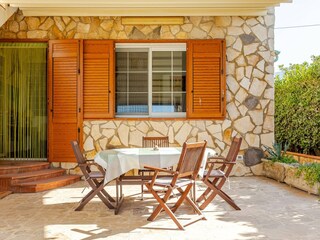Cozy seating area in front of the house