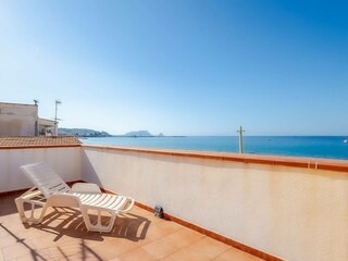 Rooftop terrace with sea view and lounger