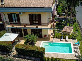 Aerial view of villa with pool area