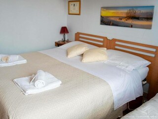 Bedroom with double and single bed
