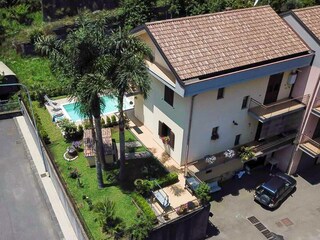 Aerial view of the villa with parking