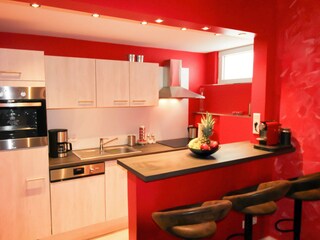 Open and fully equipped kitchen with Nespresso-machine