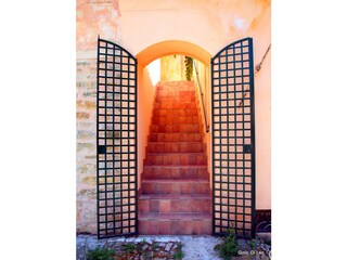 Arched entrance with staircase