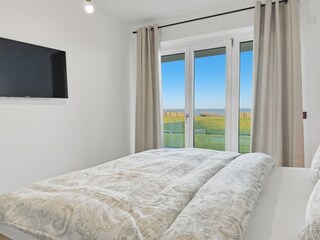 Das Schlafzimmer mit Meerblick