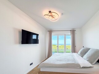 Schlafzimmer an der Duhner Spitze mit Meerblick