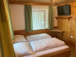 Haus Martin_Appartement Eichhörnchen Schlafzimmer