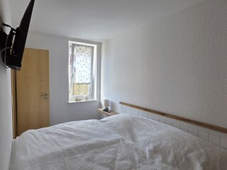 Schlafzimmer mit Doppelbett