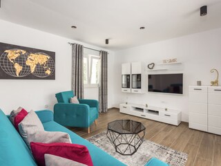Modern living room with TV in villa