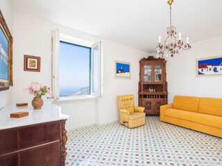 Wohnzimmer der Gruner Suite, Schlafsofa und Meerblick