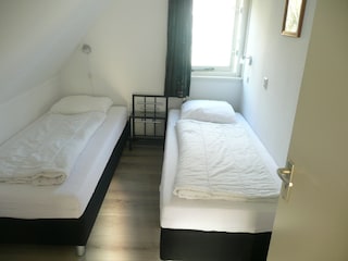 Schlafzimmer mit 2 Einzelbetten