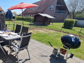 Sunny south-facing terrace with garden
