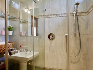 Bright bathroom with shower and sink