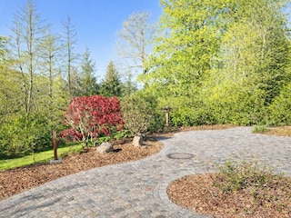 Well-maintained grounds with a beautiful garden view