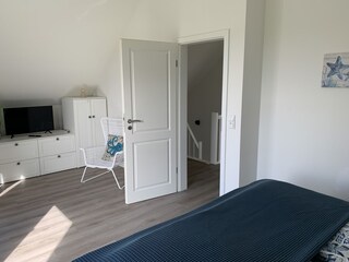Das zweite Schlafzimmer im OG.