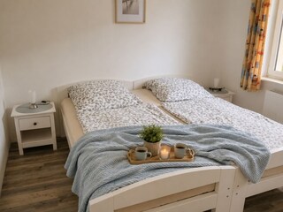 Das Schlafzimmer im Erdgeschoss.