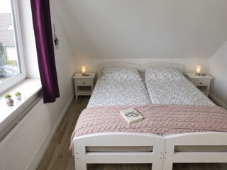 Das zweite Schlafzimmer im 1. Stock.