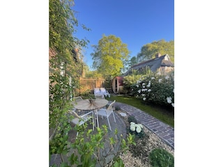 Garten mit Terrasse, Außensauna und Sonnenliegen