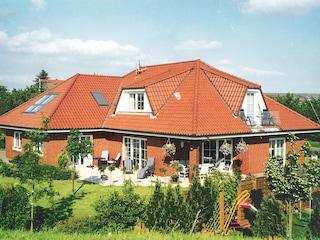 Hausansicht vom Deich aus