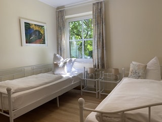 Schlafzimmer mit Einzelbetten