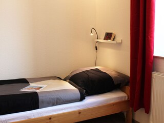 Schlafzimmer mit komfortablen Betten
