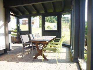 Covered dining table on the terrace