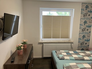 Das kleinere Schlafzimmer der Ferienwohnung