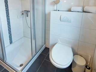 Dusche mit kleiner Duschwanne