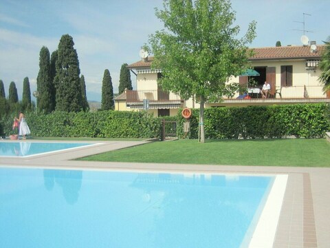Maison de vacances Appartement avec jardin et piscine près du lac de Garde