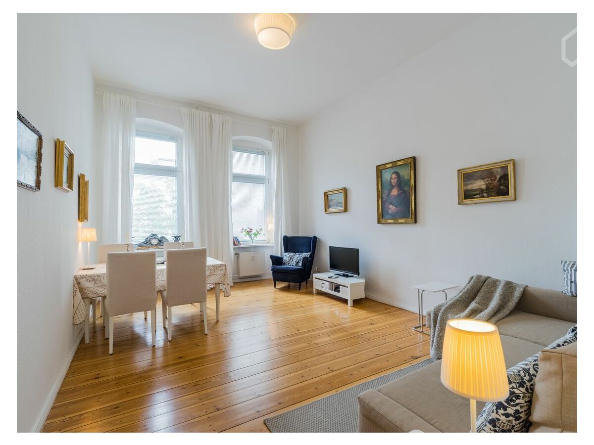 big and sunny Living-room with big table und Couch