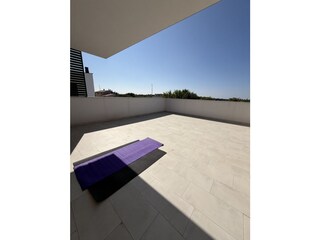 Morgen-Yoga auf der Dachterrasse