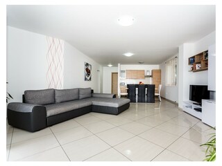 Sleeping sofa for the fifth person in the living area