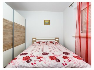 Schlafzimmer mit franzözischem Bett
