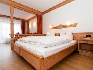 Apartmenthaus an der Rottach, Wohn-/Schlafzimmer