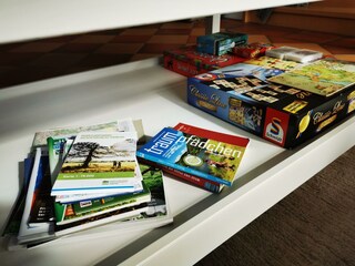 Infomaterial und Gesellschaftsspiele